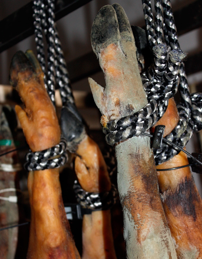 Spanish cured ham drying in Corteconcepción - Eíriz