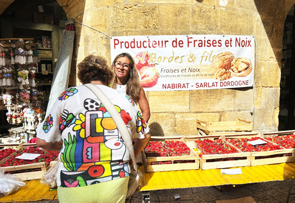 Strawberry and walnut grower at Sarlat market